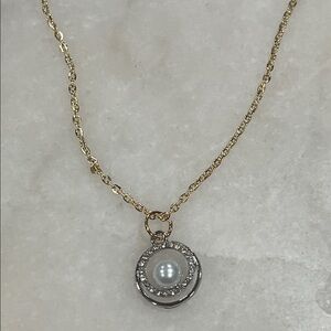 Elegant Gold and Silver Pendant Necklace